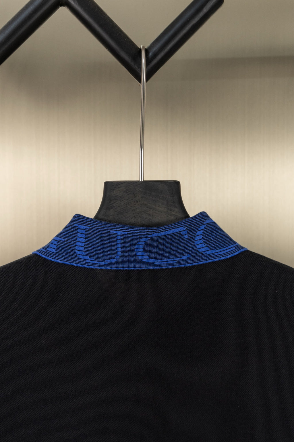 Black polo shirt with blue GUCCI logo collar trim