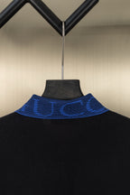 Black polo shirt with blue GUCCI logo collar trim