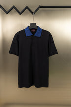 Black Gucci polo shirt with blue contrast collar and button placket