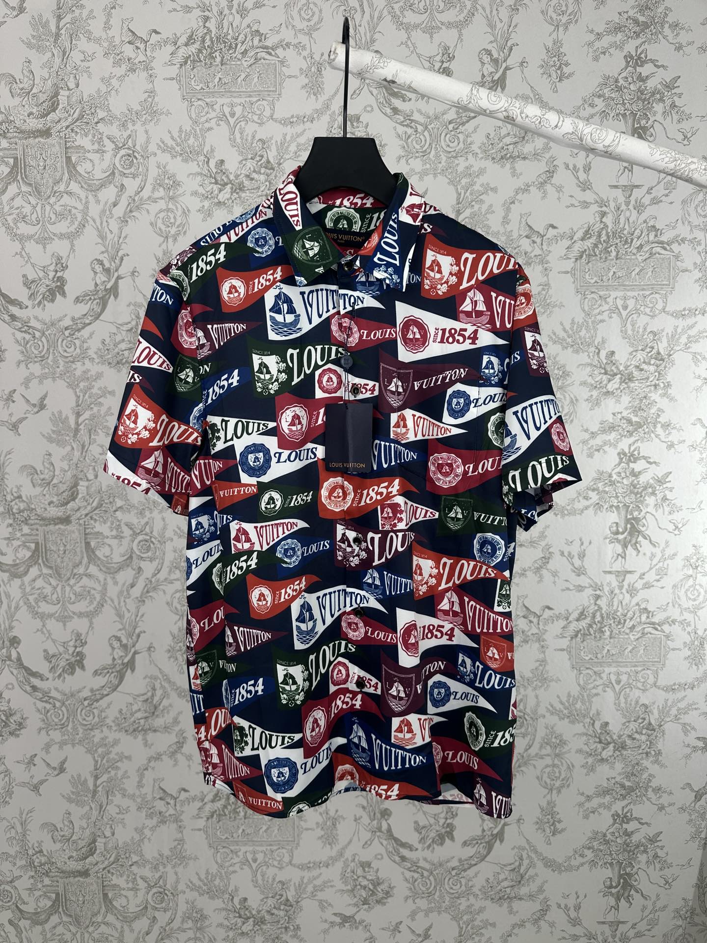 Short-sleeve shirt with multicolor Louis Vuitton logo and crest print on dark fabric