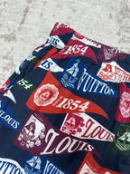 Multicolor shorts with elastic waist, bold stripes and sailing-graphic logo print
