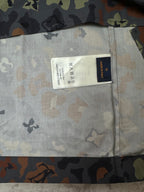 Louis Vuitton short-sleeve shirt care label on light interior fabric panel
