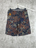 Men's patterned shorts with multicolor camo print, front button and zipper