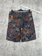 Men's patterned shorts with multicolor camo print, front button and zipper