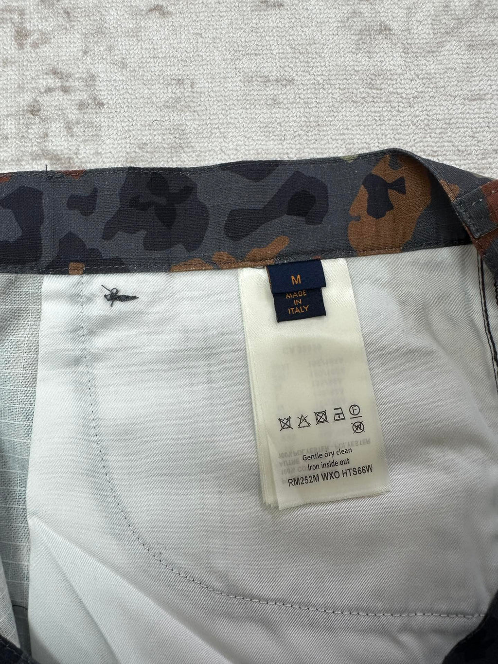 Patterned shorts interior with size label and care tag on light lining