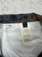 Patterned shorts interior with size label and care tag on light lining