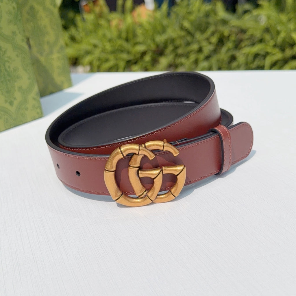 Gucci belt maroon leather strap with gold double-G buckle and black lining