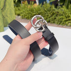 Leather belt with silver double-G buckle, dark strap and metal loops