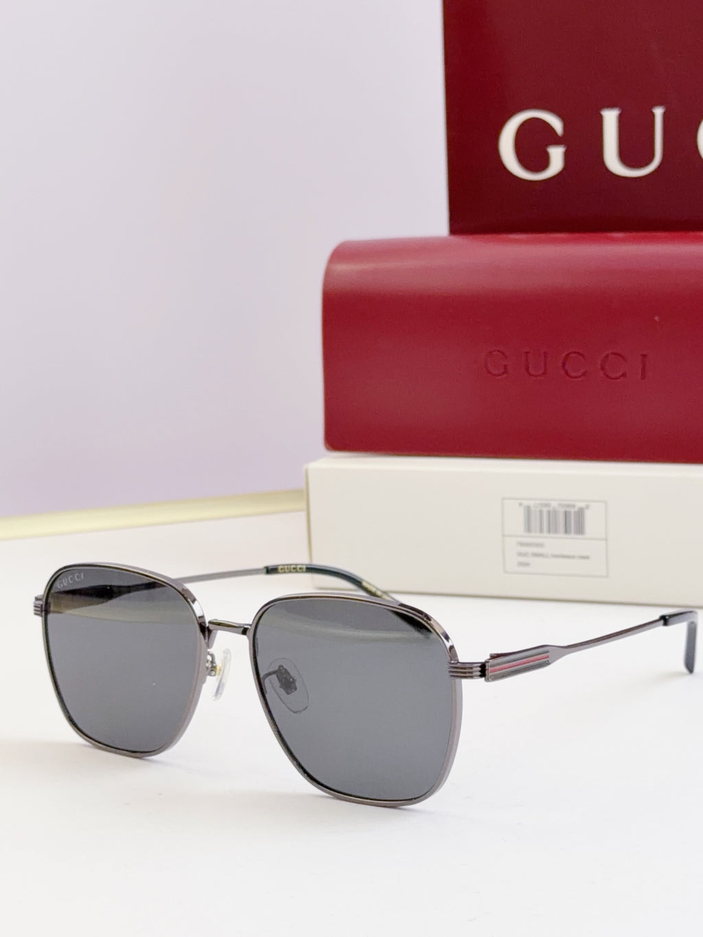 Gucci glasses with dark lenses and silver round frames