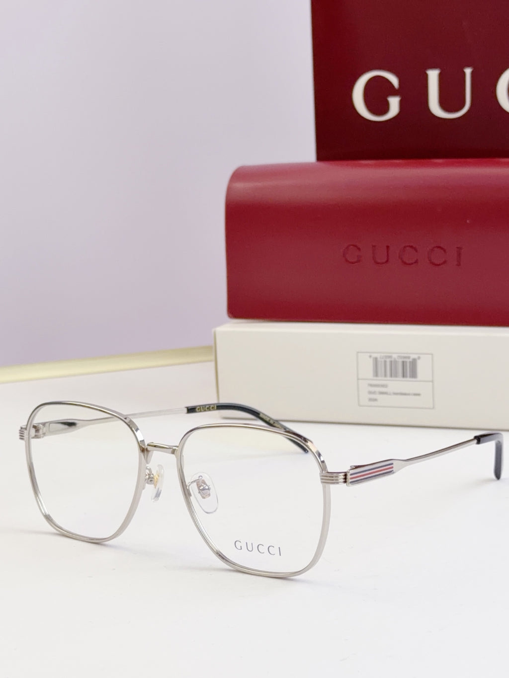 Gucci glasses with clear lenses and silver metal round frames