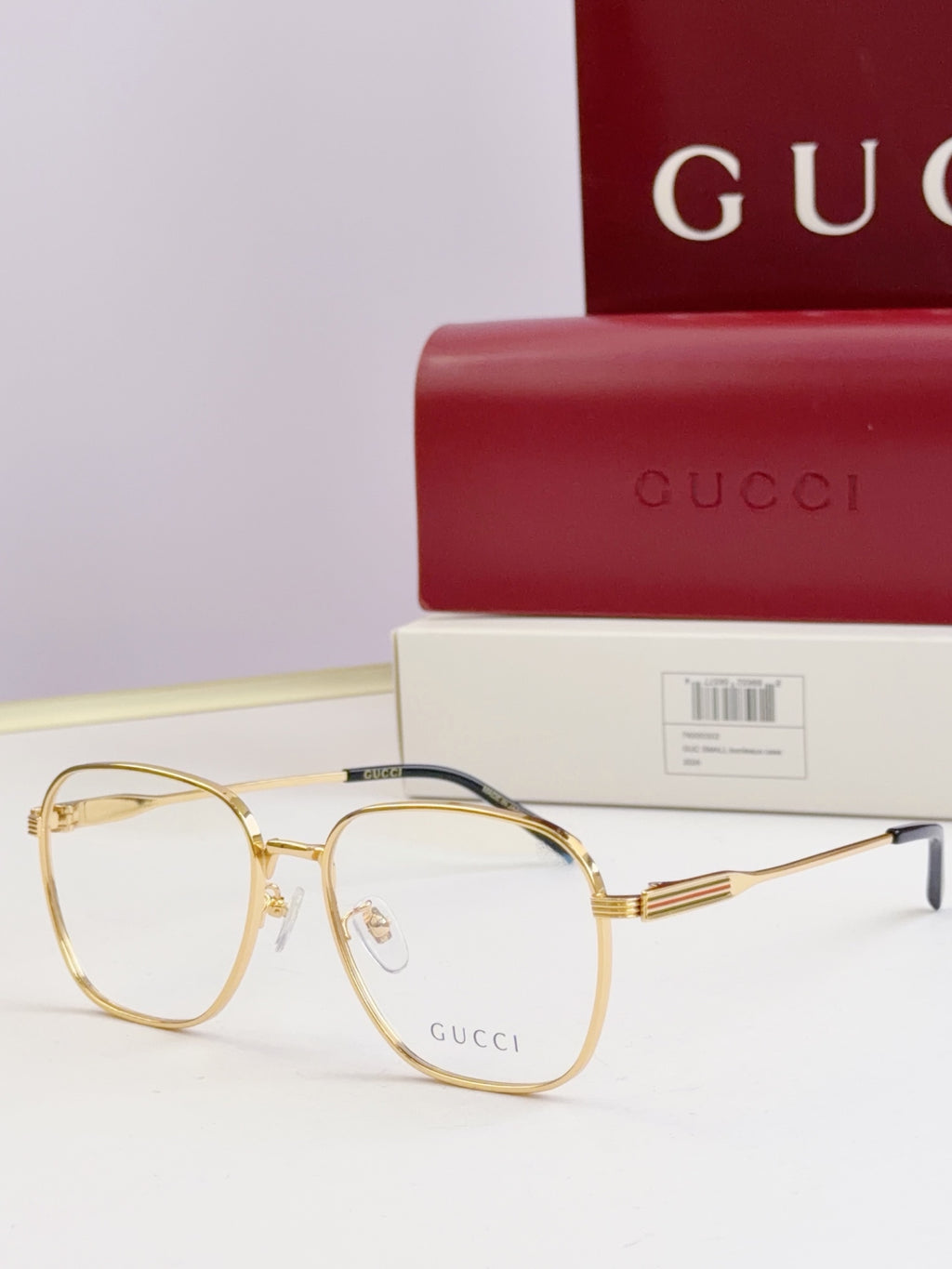 Gucci glasses with clear lenses and gold metal round frames