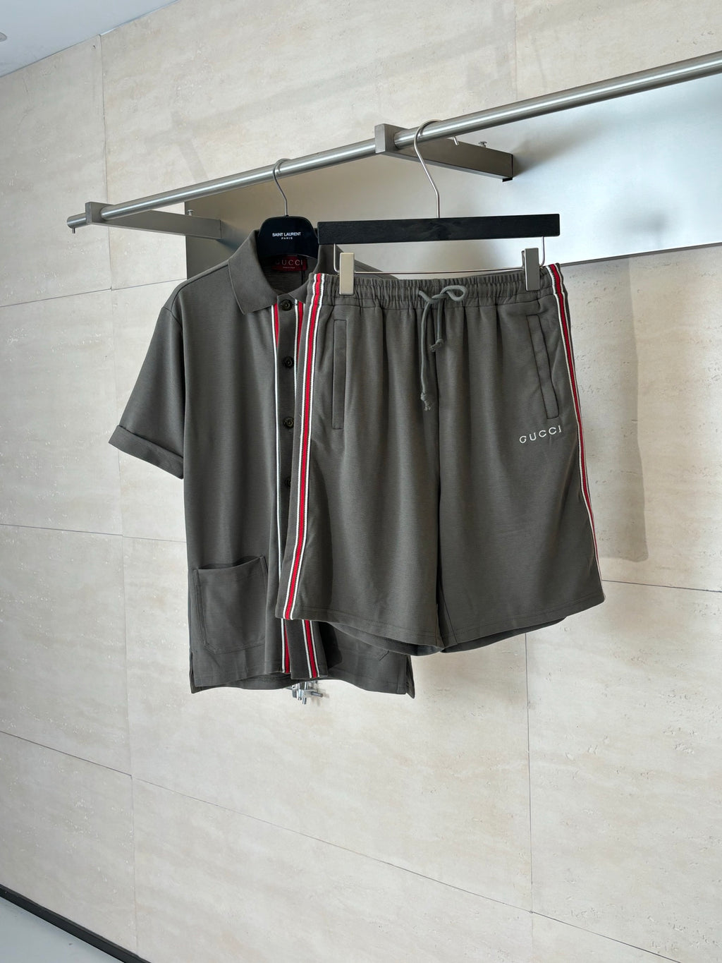 Dark gray Gucci shorts with drawstring, elastic waist, and red-green side stripe