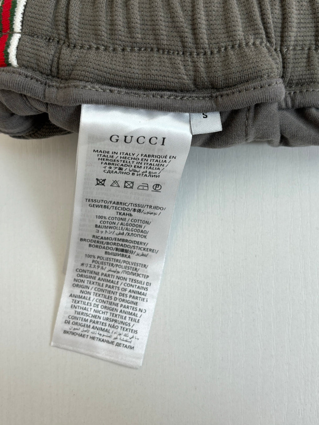 Gucci shorts care label on waistband tag
