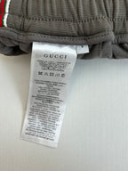 Gucci shorts care label on waistband tag