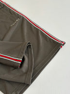 Dark gray Gucci shorts with red-green side stripe and stitched hem
