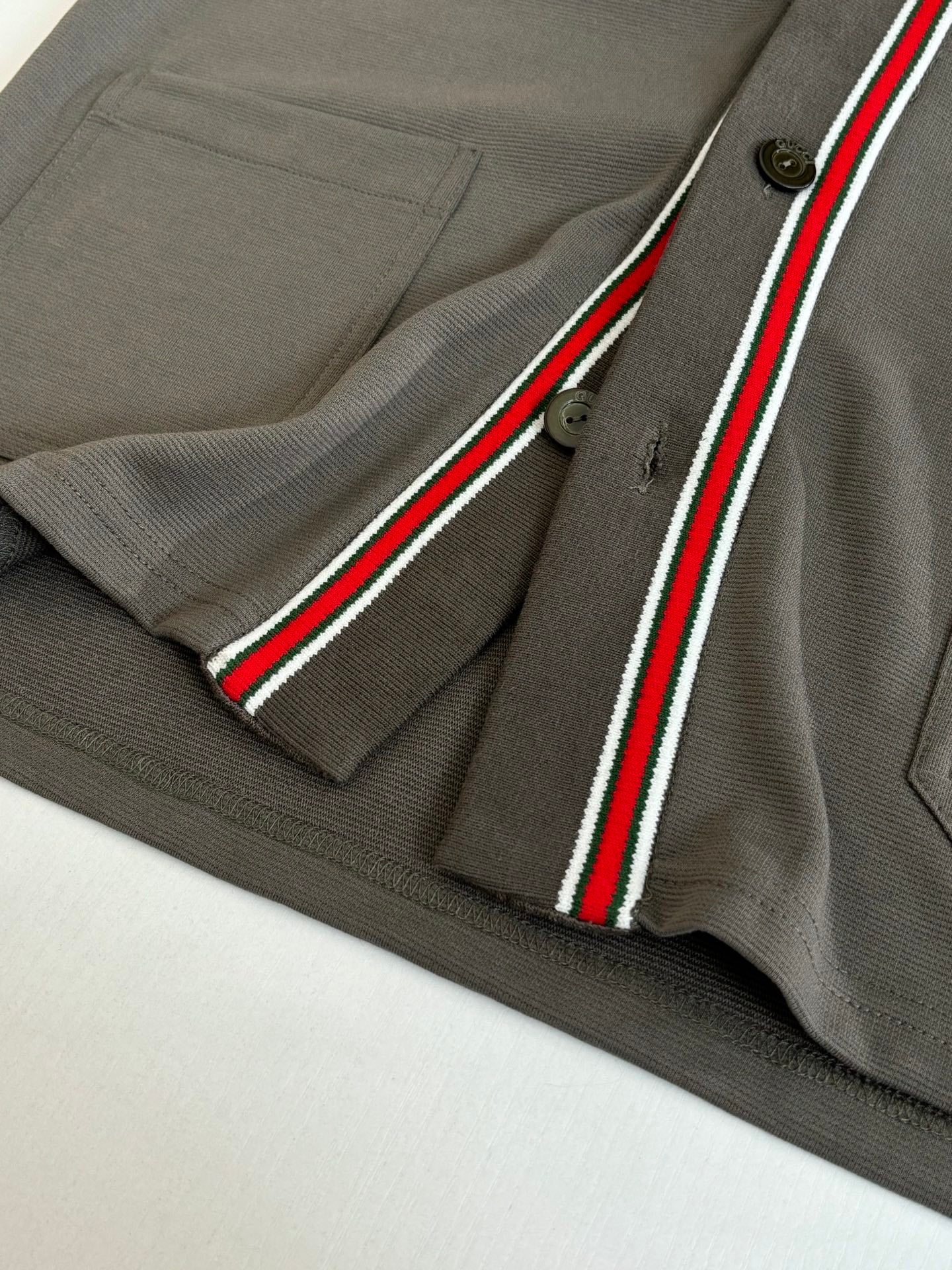 Gucci dark gray shorts with red/green/white stripe trim and button detail