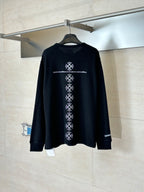 Black long-sleeve crewneck shirt with white vertical back graphic