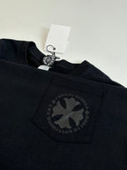 Black long-sleeve top with front logo print and woven tag