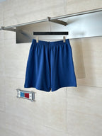 Blue Balenciaga drawstring shorts on hanger, relaxed fit with elastic waist