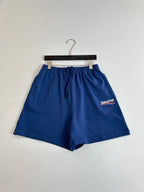 Balenciaga blue shorts with drawstring tie and side logo patch