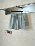 Gray heather shorts with elastic waistband and drawstring, Balenciaga logo on leg