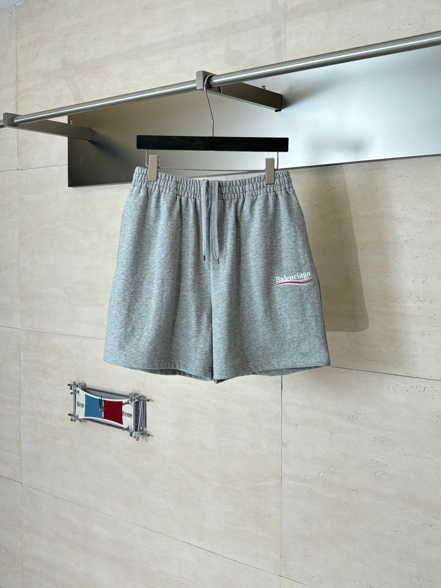 Balenciaga heather gray drawstring shorts with elastic waistband and small logo on front
