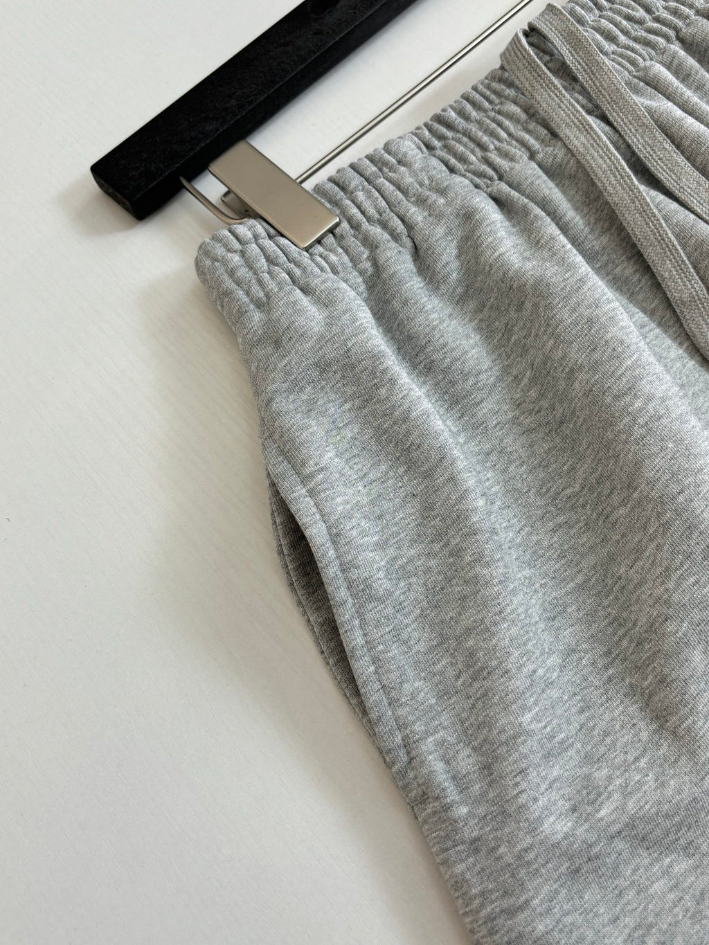 Balenciaga heather gray knit shorts with gathered elastic waistband and drawstring cord