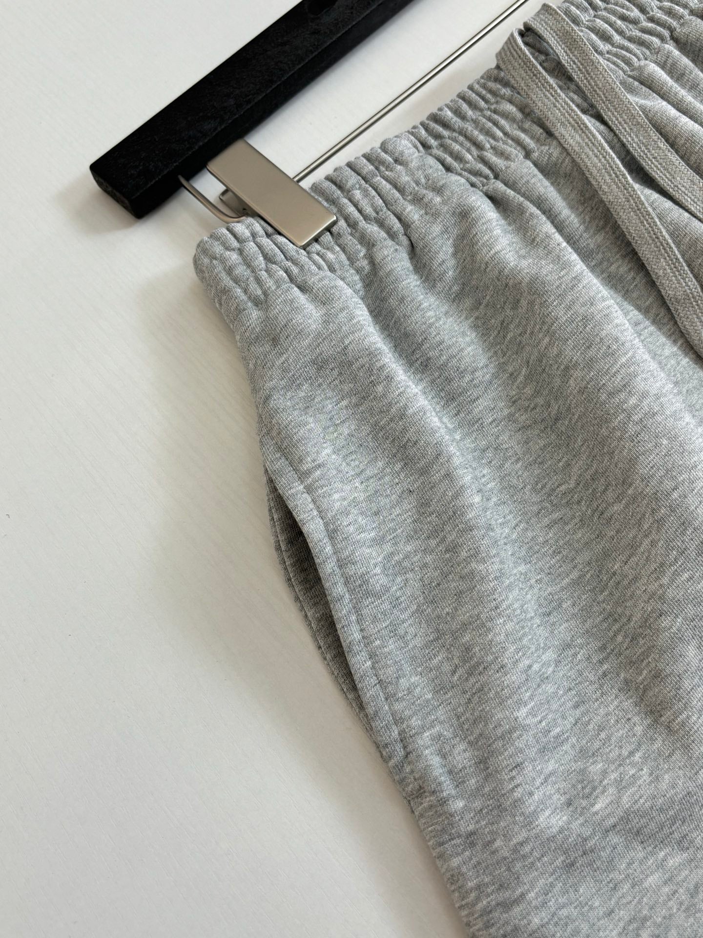 Balenciaga heather gray knit shorts with gathered elastic waistband and drawstring cord