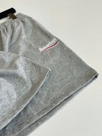 Gray heather shorts with drawstring and Balenciaga logo near side hem