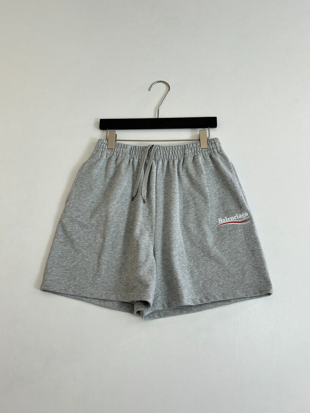 Balenciaga heather gray drawstring shorts with front slit pockets and logo patch