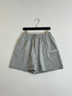Balenciaga heather gray drawstring shorts with front slit pockets and logo patch