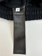 Black drawstring shorts fabric care label on inner waistband