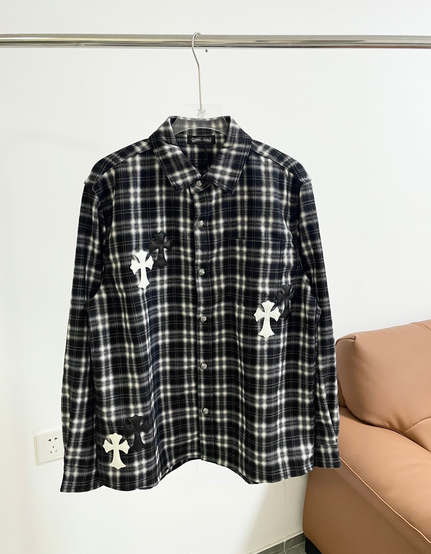 Long-sleeve plaid button-up shirt, black and white with white cross appliques