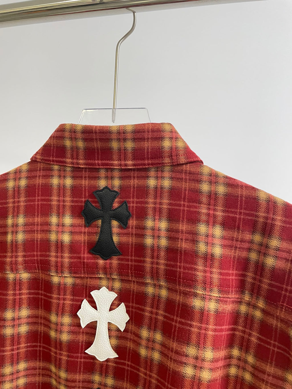 Red plaid shirt back with large cross appliques and yoke detail