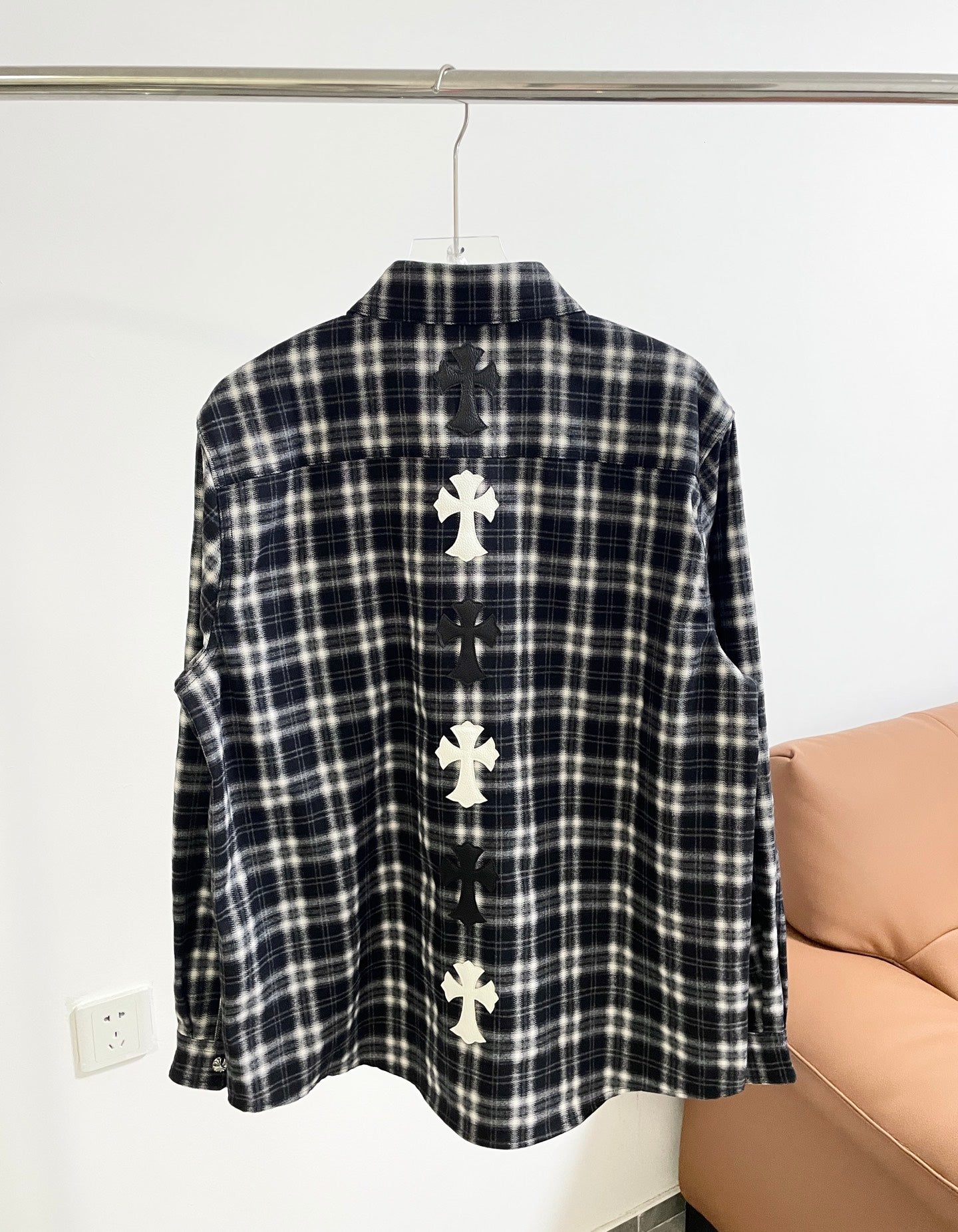 Black and white plaid long-sleeve shirt back with stacked cross appliques
