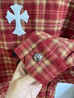 Red plaid sleeve with gathered cuff and decorative metal button