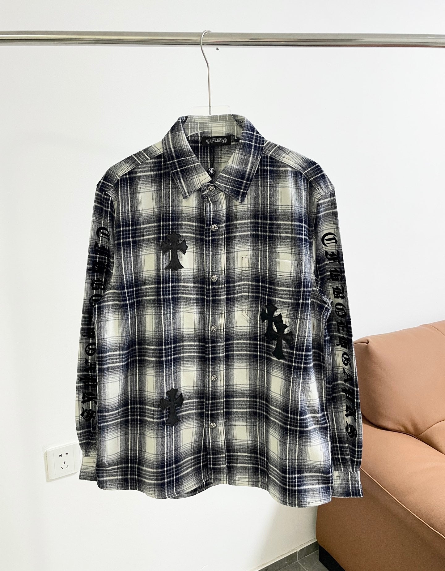 Long-sleeve plaid shirt in dark gray and blue with black embroidered motifs