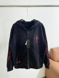 Dark zip-up hoodie with hood and front cross emblem in red embroidery