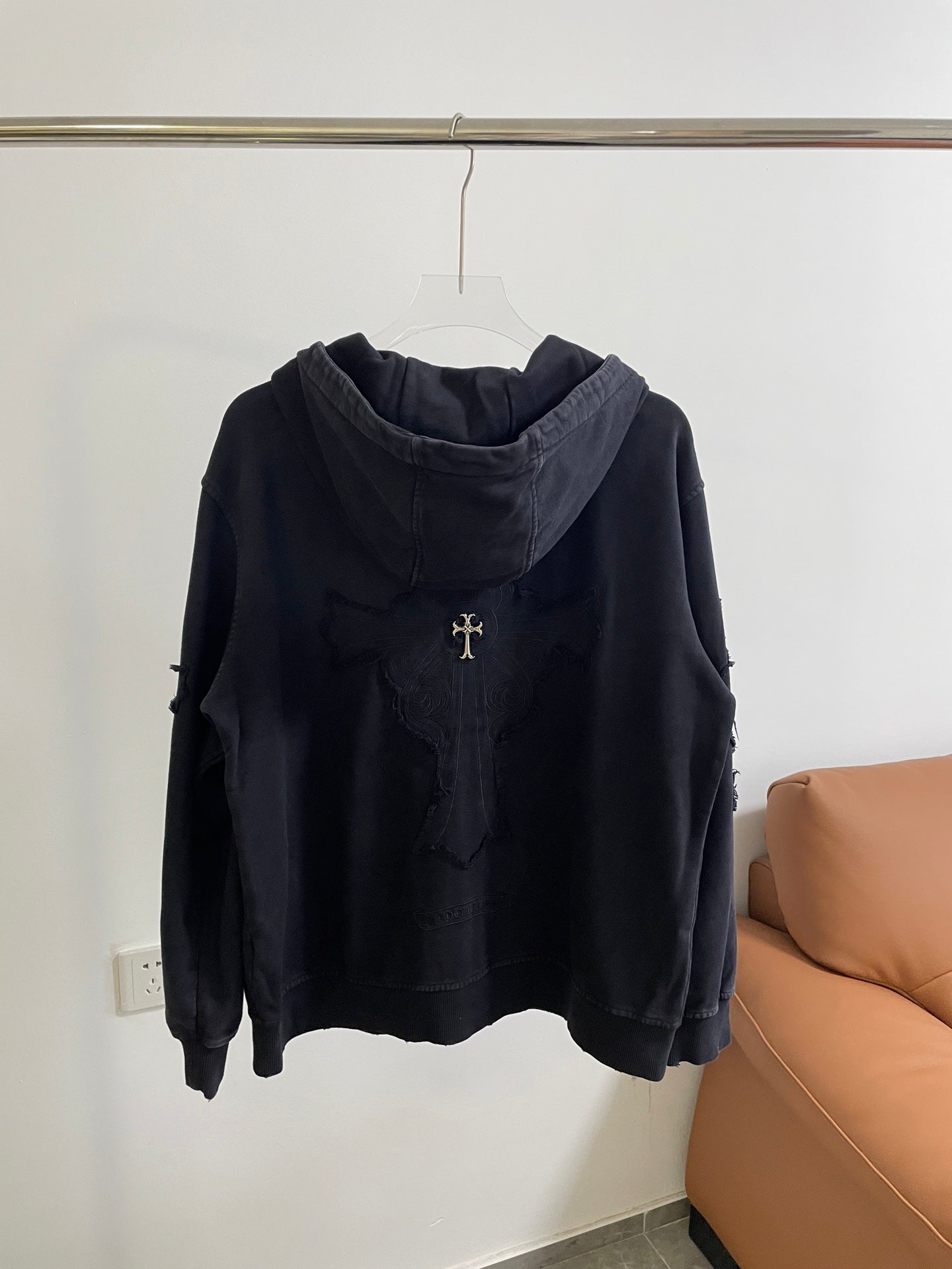 Long sleeve zip-up hooded jacket, dark blue, with hood and front emblem graphic