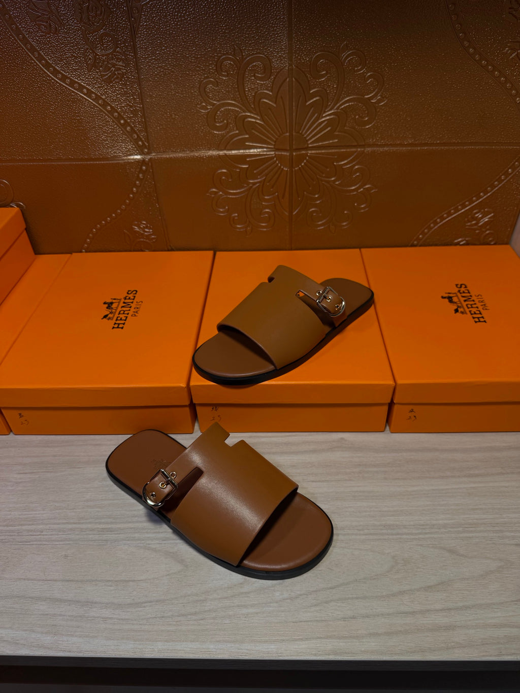 Hermes leather slide sandals, wide vamp strap with silver buckle, dark brown
