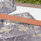 Tan leather belt with 'Christian Dior' text stamp