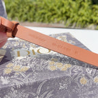 Dior belt tan leather underside with engraved text