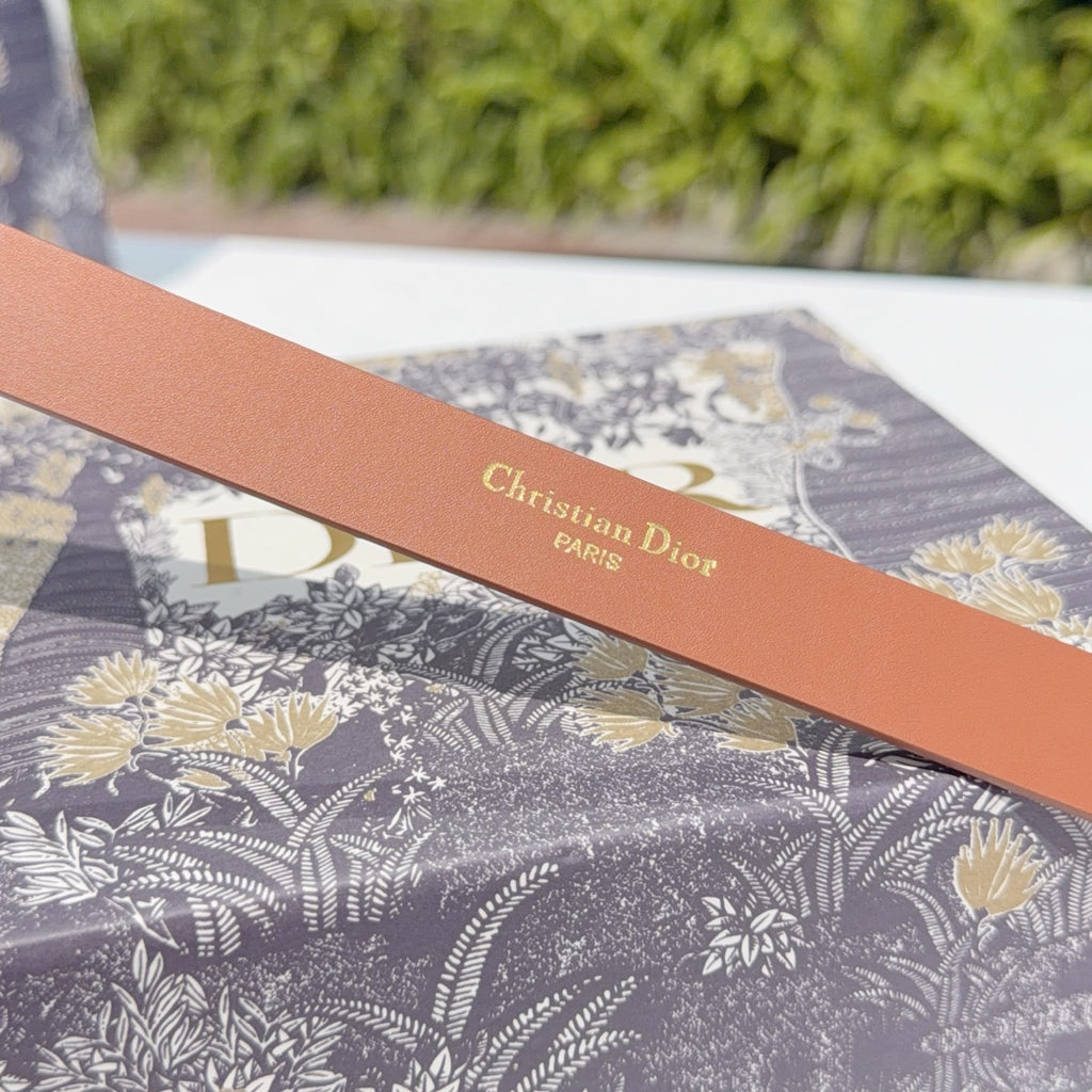 Dior belt tan leather strap with engraved "Christian Dior Paris" lettering