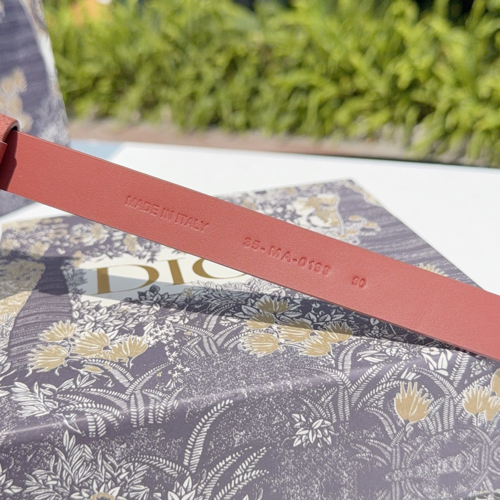 Rust belt strap with printed branding and country text