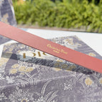 Rust belt strap with 'Christian Dior' and 'PARIS' printed