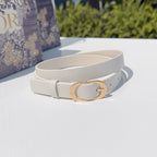 Light gray leather belt with gold-tone oval buckle, single strap loop