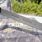 Dior belt strap showing gray engraving text and size code