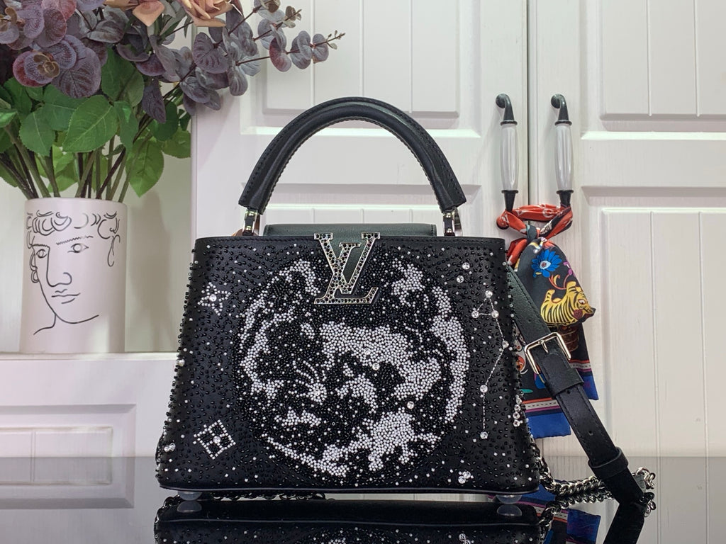 Louis Vuitton handbag, black sequin top-handle with white monogram-style pattern