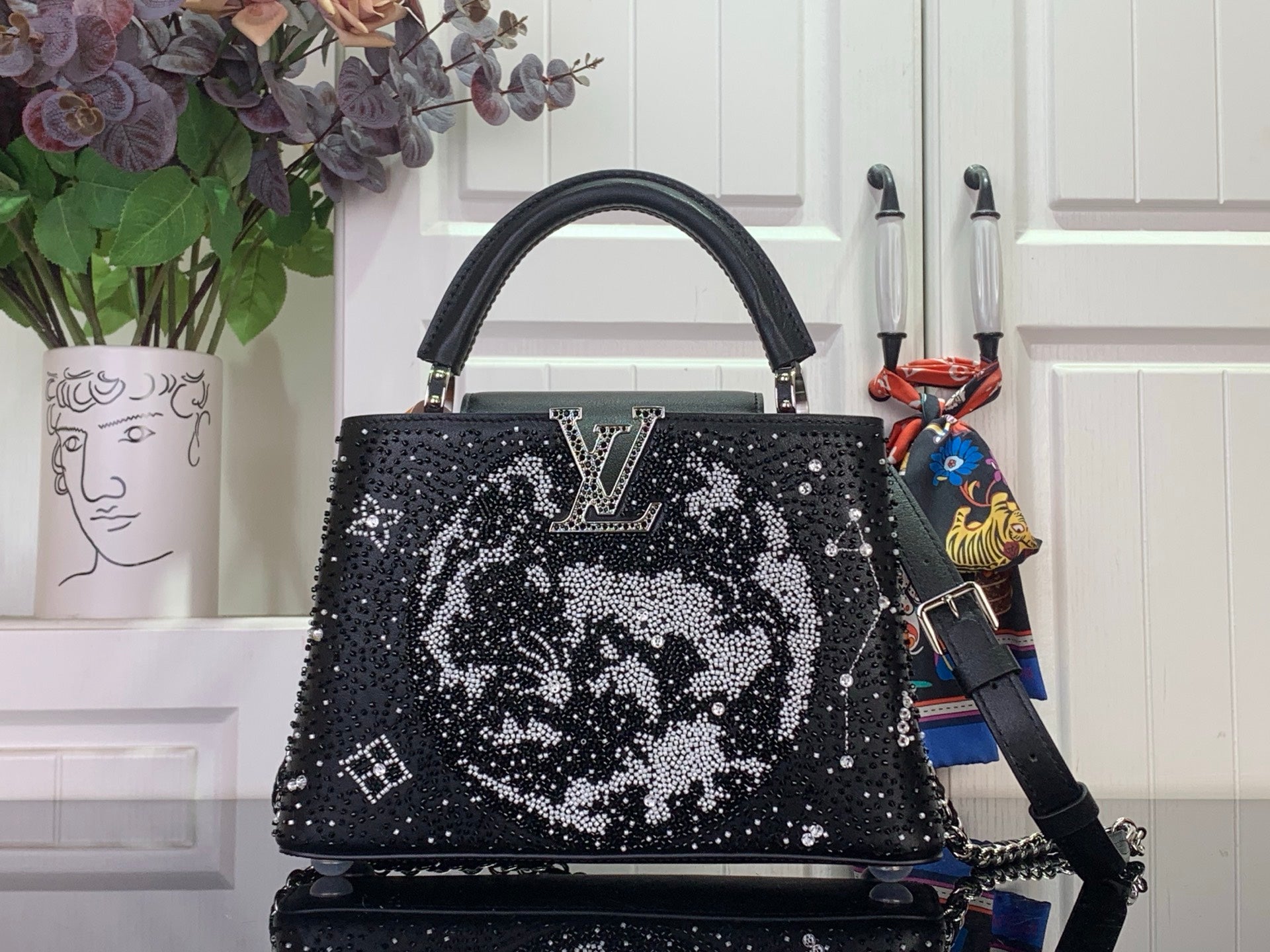 Louis Vuitton handbag, black sequin top-handle with white monogram-style pattern