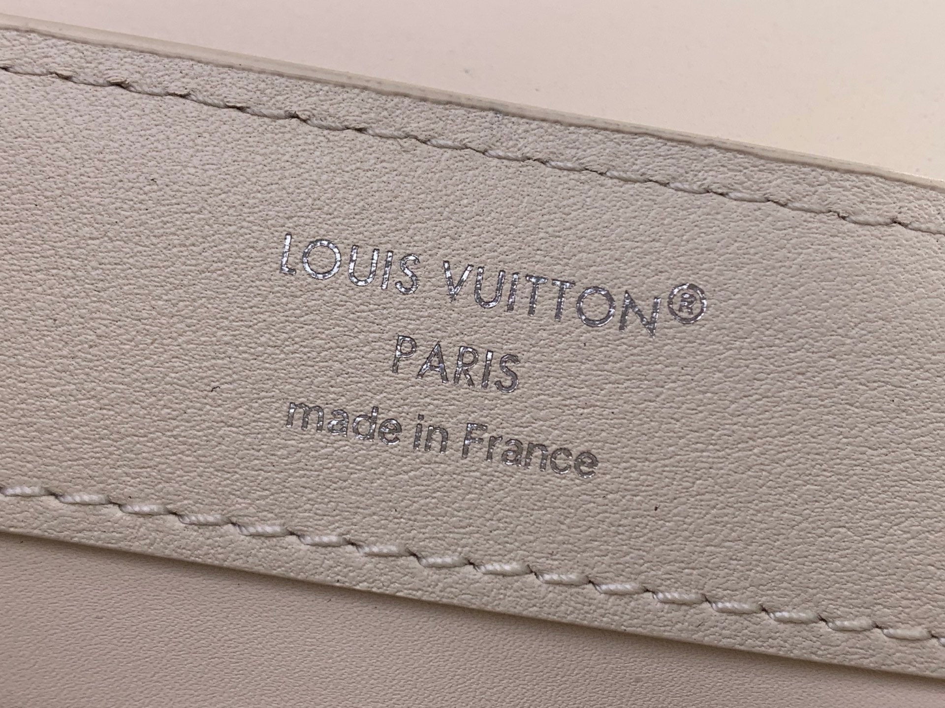 Louis Vuitton Paris leather label reading Made in France